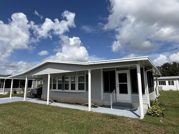 Winter Haven, FL Mobile Home for Sale located at 403 Tennis Lane Swiss Golf & Tennis